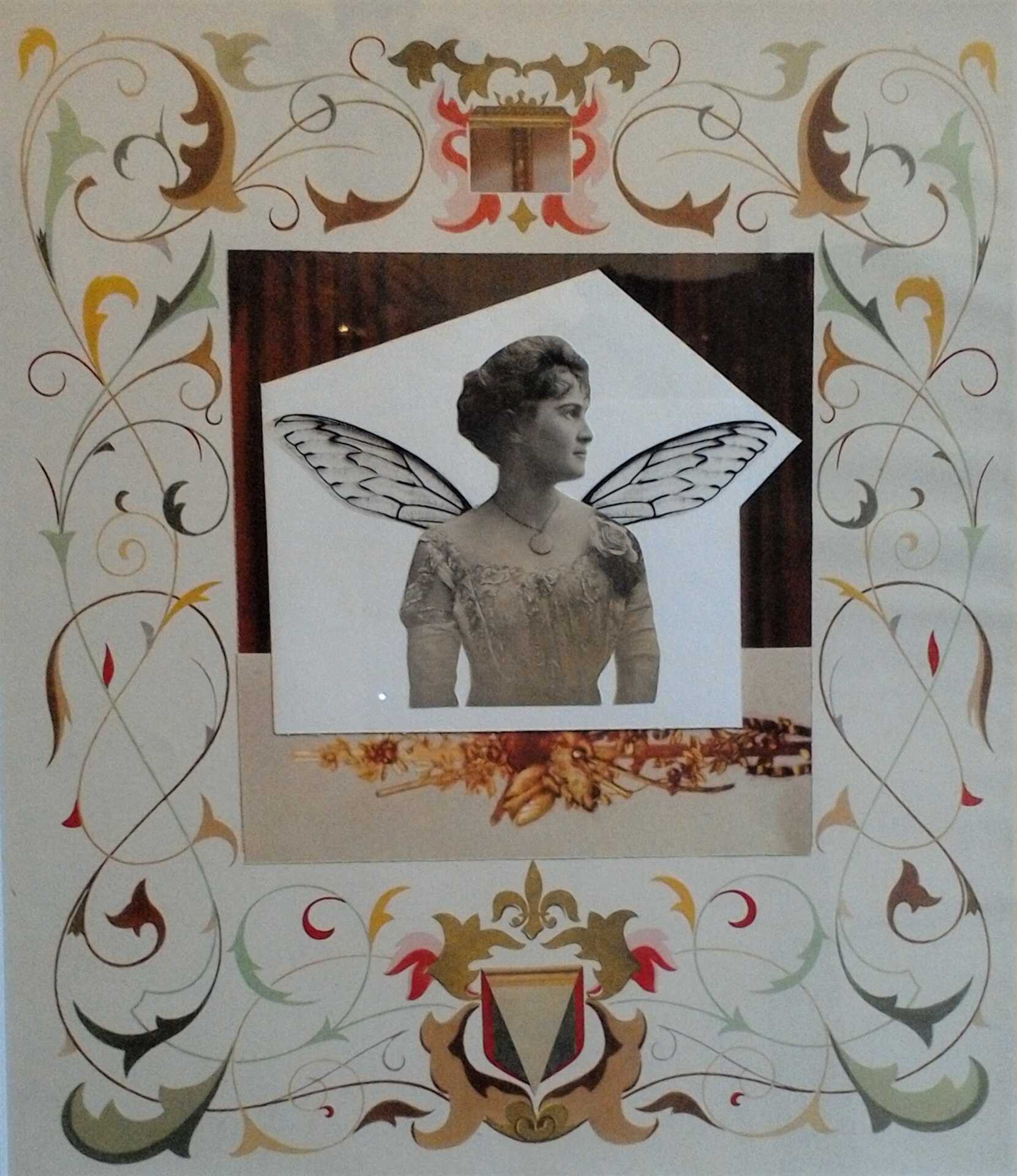 Collage work "Hilda" by Libby Bloxham. An elaborate ornamental border of swirling leaves and heraldric elements frames a square photograph of some kind of floral ornament. layered over the photograph is a vintage B&W photo of a woman early 1900s dress, standing square on to the viewer while looking off to her left side. From her back sprout insect-like wings cut from acetate film.