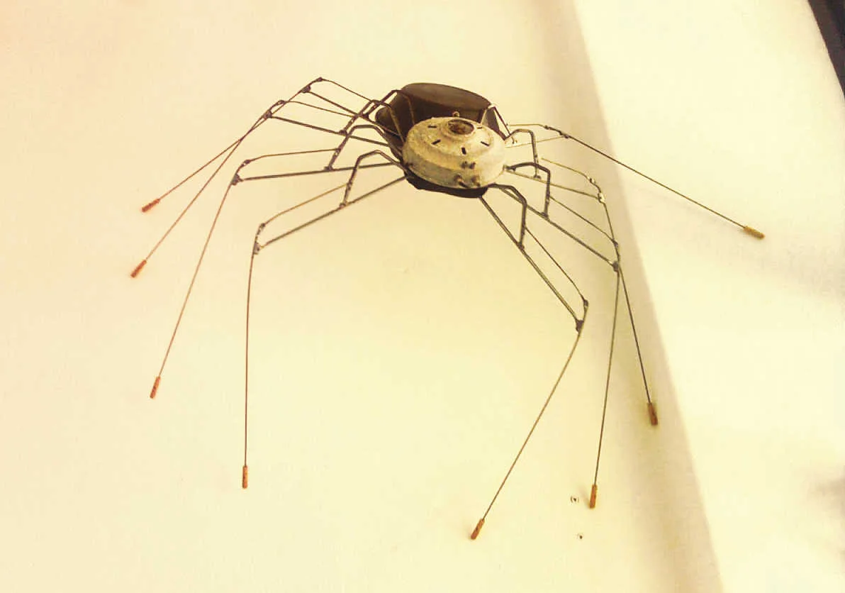 Daddy long legs spider from 'Celebrating Diversity' by Libby Bloxham. It's constructed from recycled metal and industrial components, including tin bowls, umbrella spokes and wire.
